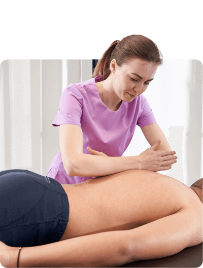 A woman providing massage therapy to a man.
