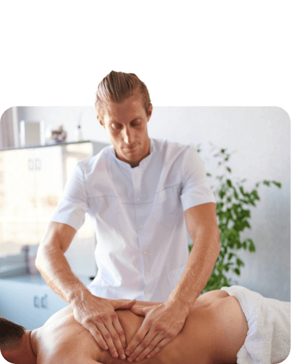 A man receiving massage therapy at a spa.