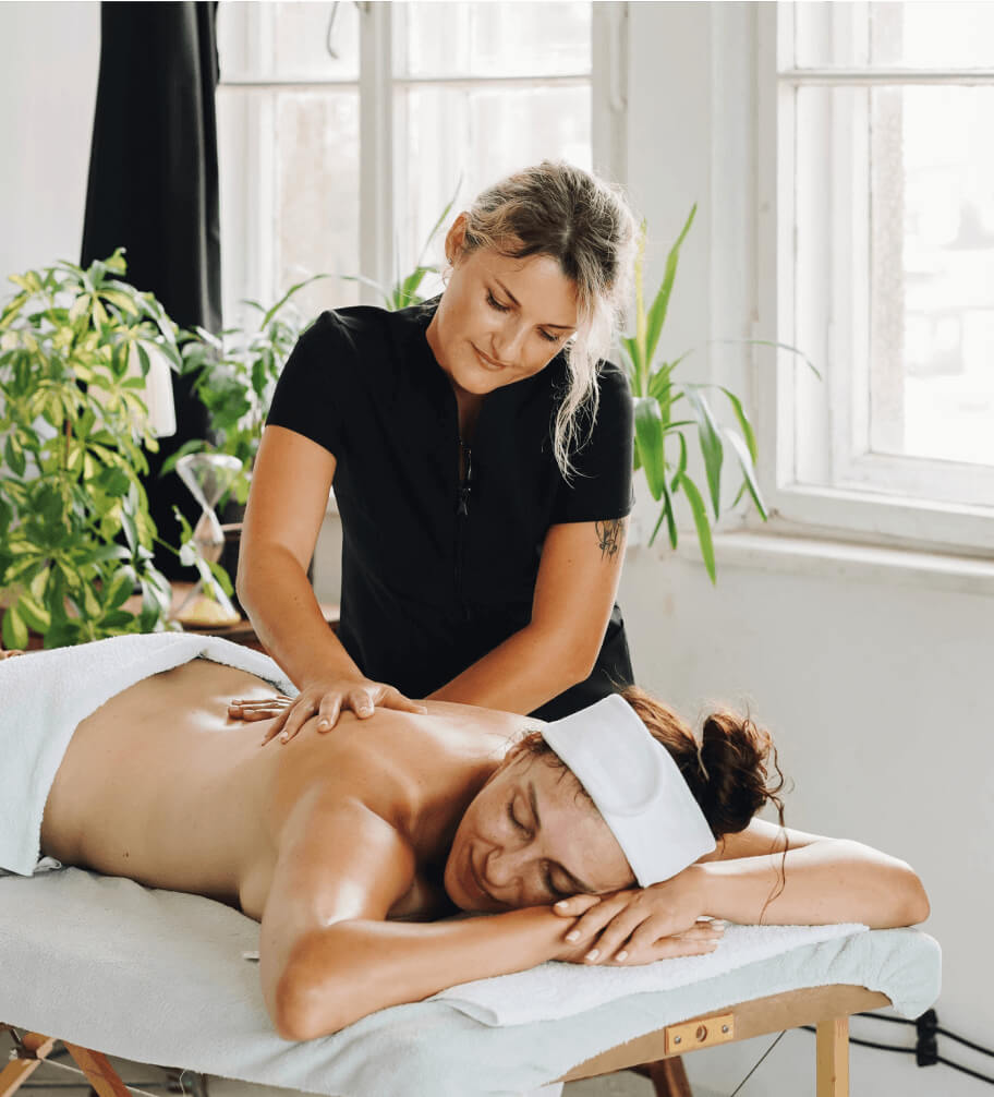 A woman receiving massage therapy