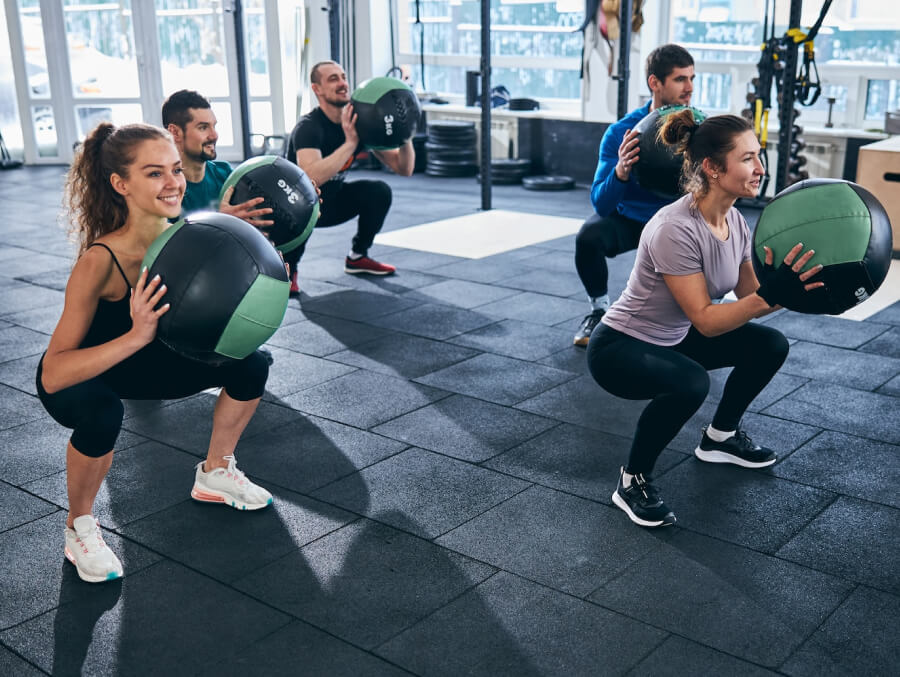 A group of people doing physiotherapy in a gym as corporate wellness in Melbourne
