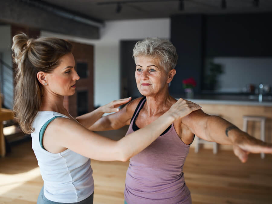 Two women working out in Domain Health